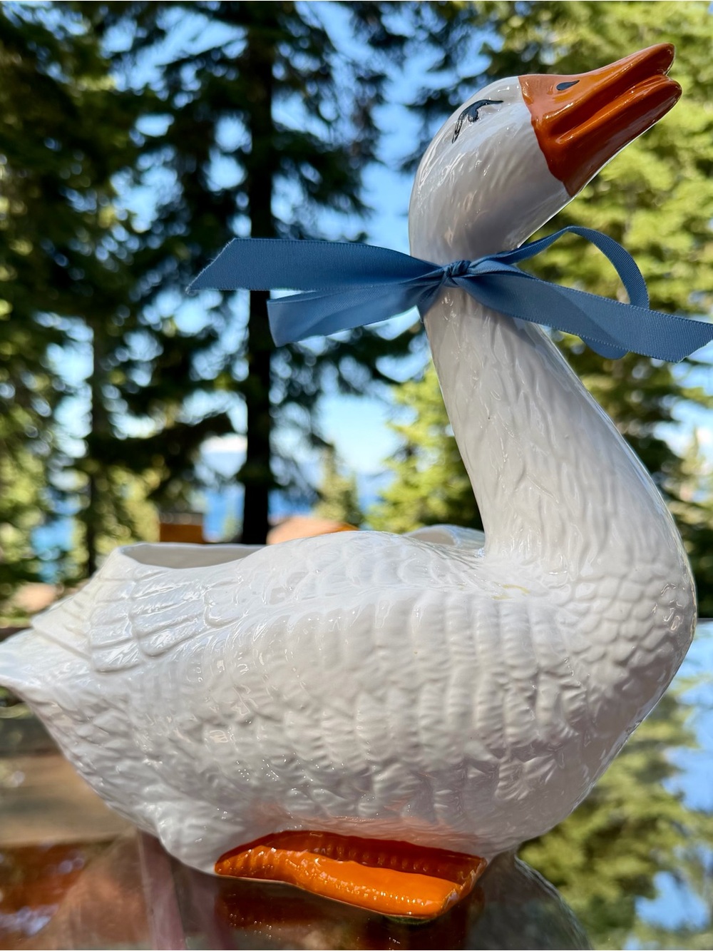White Ceramic Goose Planter with Blue Ribbon and Orange Accents